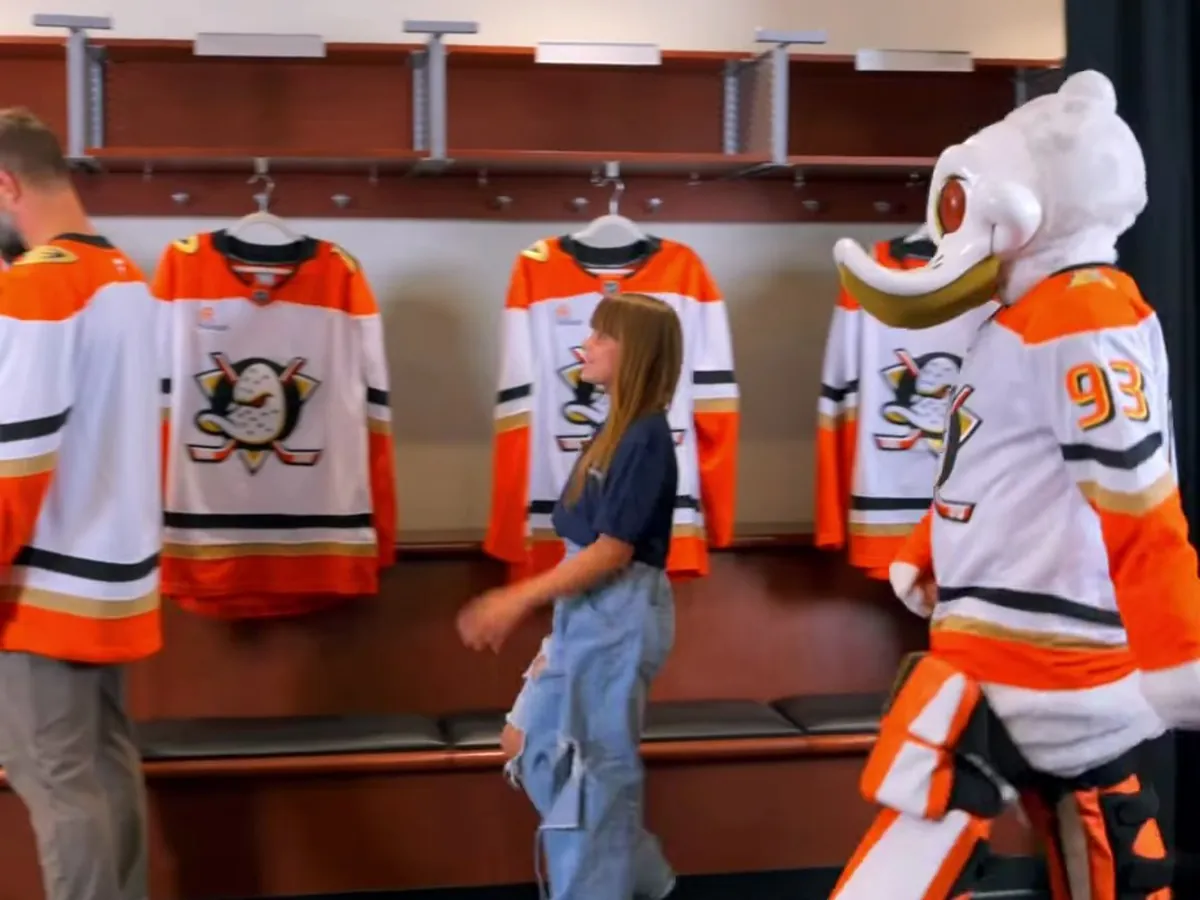 Tynka Gudas and Wild Wing in the Ducks locker room